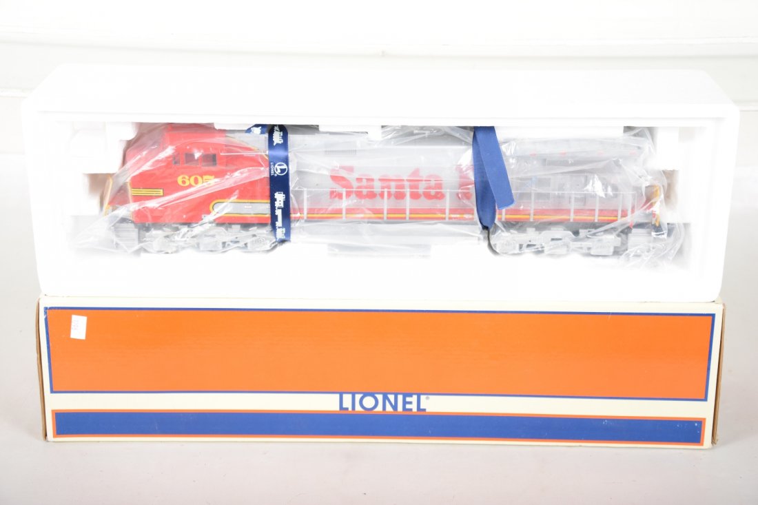 Lionel 18254 SF Dash-9 Diesel: Nice dual motor diesel equipped with TMCC, RailSounds with TowerCom & CrewTalk. It show light runtime with dusty, C9 body with box.