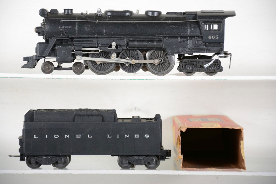 Lionel 665 Steam Locomotive: Nice matte patina with clean rods; matching 6026W whistling tender with rough ob. They show light to moderate playwear, C7-7+