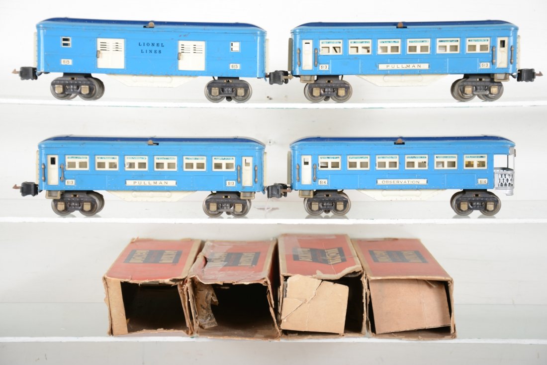 Boxed Lionel 613 Blue Comet Cars: Circa 1936-7. All are clean & shiny, including a 615 baggage; 2 #613 Pullmans; 614 observation. All have Manuel box couplers, great lettering and match in color as a set. Their boxes are worn , as pho