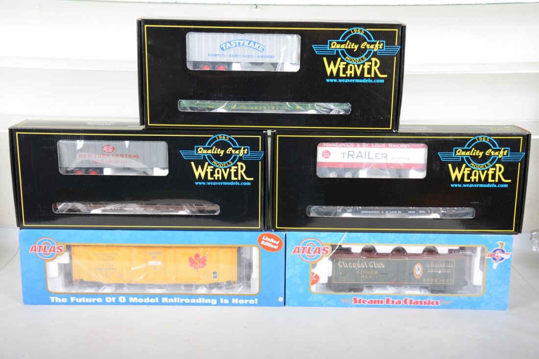 Weaver & Atlas Standard O Freight Cars: Includes Atlas 8195 Clicquot reefer; 8863 Naperville plugdoor boxcar; Weaver M&StL trailer flat; NYC trailer flat; Reading/Tastykake trailer flat. All appear new in boxes, C10