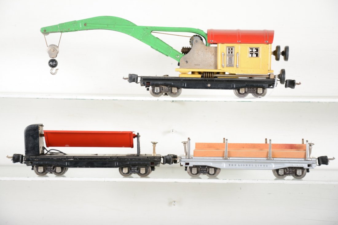 Lionel 2800 Series Freight Cars: Includes a 2810 crane, functional, regeared; 3859 coal dump car; 2811 lumber, replaced load, but nice silver. They show light playwear, otherwise C7-7+