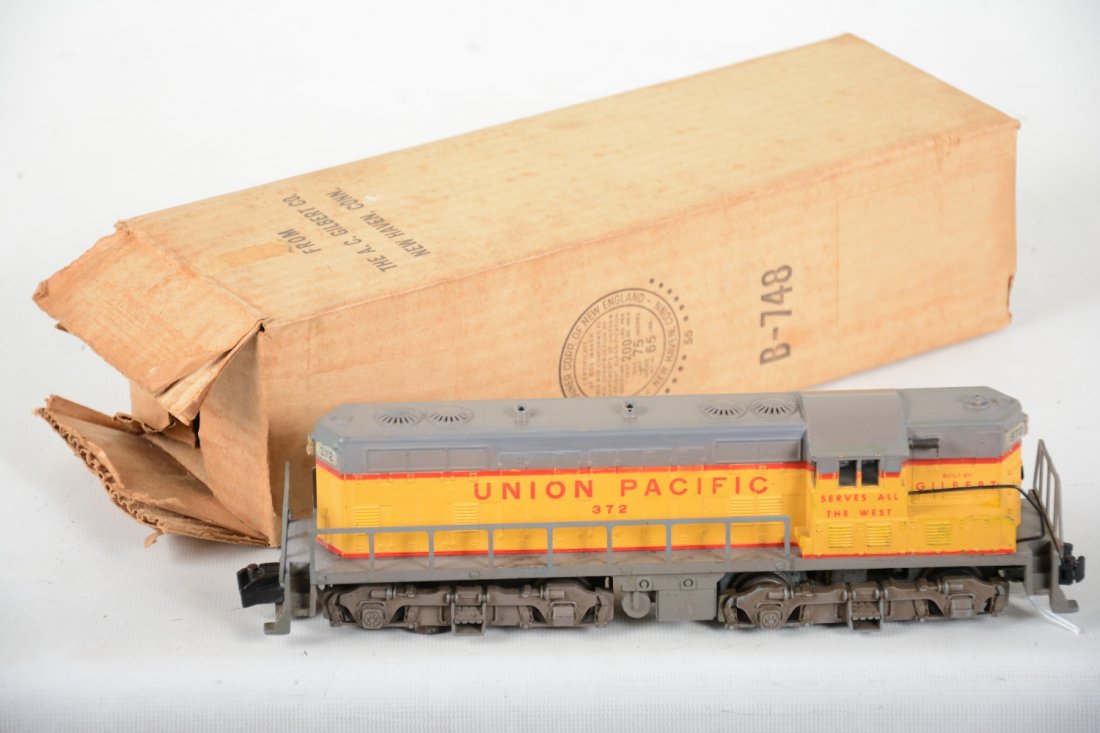 Boxed American Flyer 372 UP GP7 Diesel: S Gauge. Clean example with a bit of touch-up on roof edge. It shows moderate playwear with box & wrap, C6