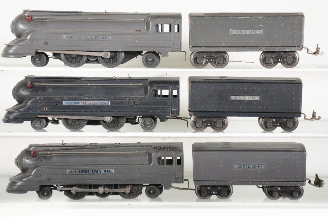 Lionel Junior Steam Locomotives: Includes a 1668 loco with 1689W tender, gunmetal, C5; 1688 loco with matching 1689T tender, black; 1688E loco with matching 1689T tender, gunmetal, rest show light to moderate playwear, C7-7+