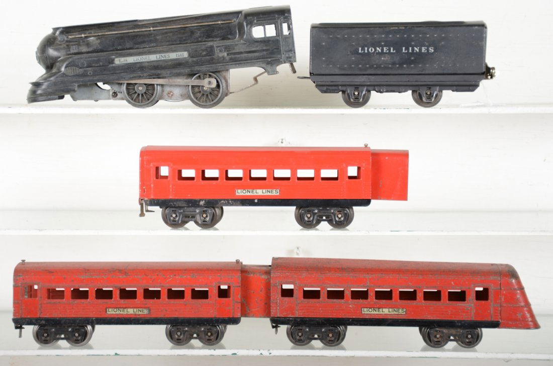 Lionel 1588 Streamline Set: Includes a 1588 Torpedo loco. Mechanism not functioning, missing rear motor mounting plate; 1588T tender; 1673 FE coach, C7; 1673 coach; 1674 beavertail observation. Rest show heavy playwear, C3-4