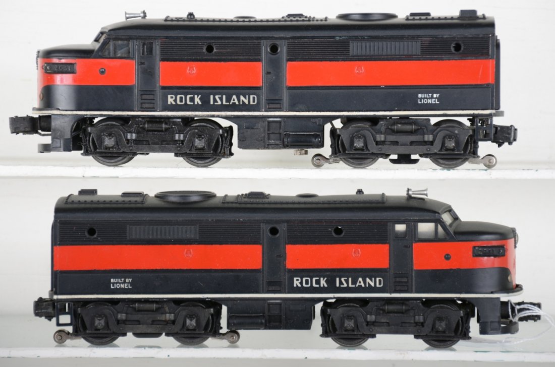 Clean Lionel 2032 Rock Island Alco Diesels: Shells are very nice clean with 98% decals and match nicely frames have nice stripes, but power has repaired battery damage and a bit on bracket inside. Otherwise appear C7+