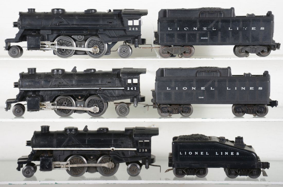 Unusual Lionel Steam Locomotives: Includes a 248 loco with metal motor; 6026W whistling tender; 238 loco with 1025T slant back tender with arch bar trucks, loco missing front steps & running lights; 241 cast loco with smoke & thin str