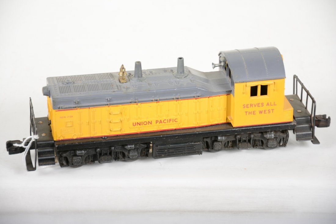 Lionel 613 UP NW2 Diesel: Tough 1958 diesel. Has nicely repaired screw hole chip. Over-all shows light playwear, appears C7+