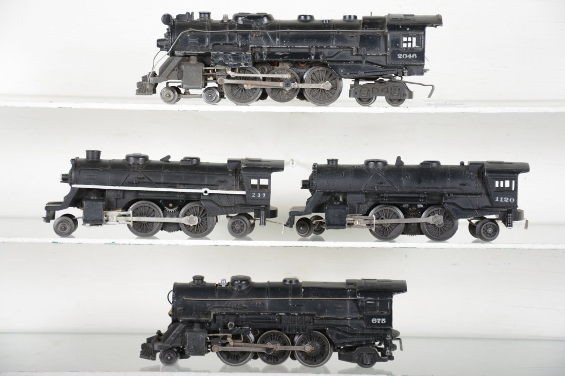 Lionel Steam Locomotives: Includes a 675, missing boiler front; 1120; scarce 237 with smoke, wide stripe, missing small front step; 2046, C4, rest show light to moderate playwear, C6(NO TENDERS)