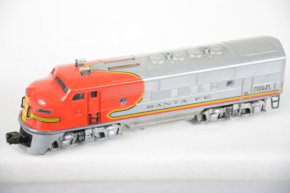 Lionel 2343 SF F3 A Diesel: Clean body with dual motors & horn. Battery box has some rust on bracket inside only. Over-all shows moderate playwear, C5+-6