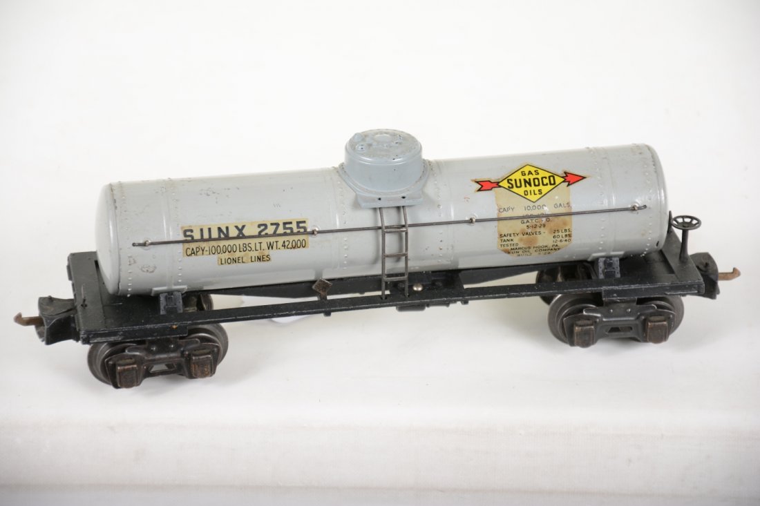 Clean Lionel 2755 Sunoco Tank Car: 1942 production in gray with nice decals and low couplers. It shows light playwear, C7-7+