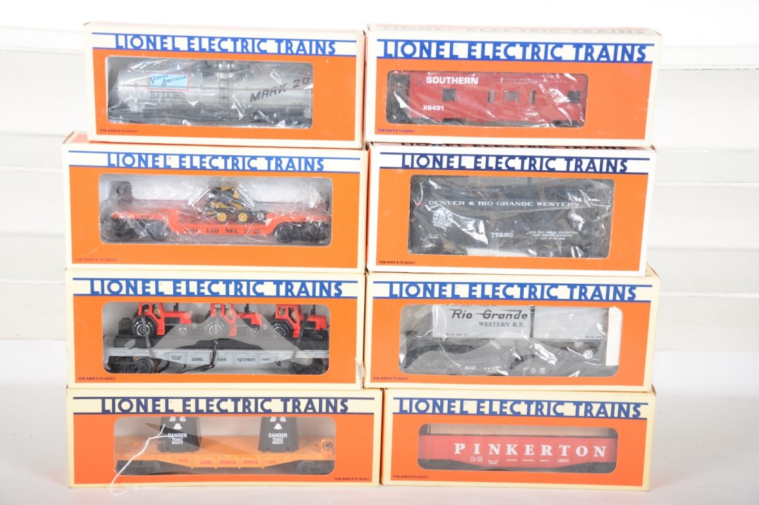 Lionel Rolling Stock: Includes 1666 toxic waist; 19601 NA 3d tank; 16958 flat with loader; 16907 flat with farm tractors; 16674 animated gondola; 16374 DRGW flat with trailers; 6431 Southern baywindow caboose; 17880 DRGW c