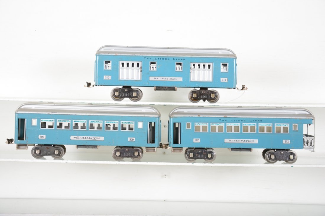 Lionel 310 Series Passenger Cars: Standard gauge. Includes 310 baggage; 309 Pullman; 312 observation. They are fairly clean with nice lettering. Silver roofs match and over-all shows moderate playwear, C6-6+