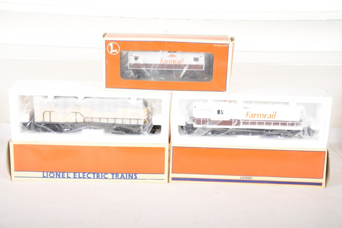 Lionel Diesel & Caboose Lot: Includes 18594 Farmrail GP7 diesel, fully upgradable with matching 17623 caboose; 52037 TCA GP-9 diesel. All are unrun with lightly worn boxes, C9-9+