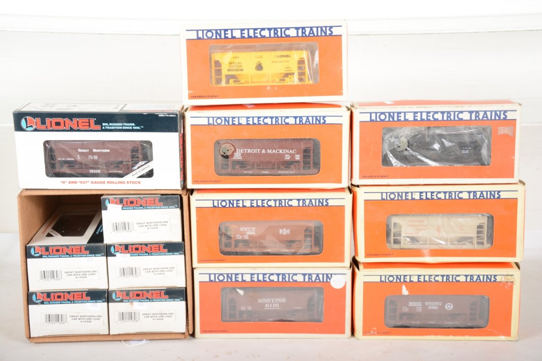 Lionel Ore Cars: Includes factory case of 6-19308 GN; 16800 LRRC; 19323 D&M; 6127 NP; 19961 Gadsden; 19321 B&LE; 19320 PRR; 6116 SOO. All appear like new with boxes, C9-10