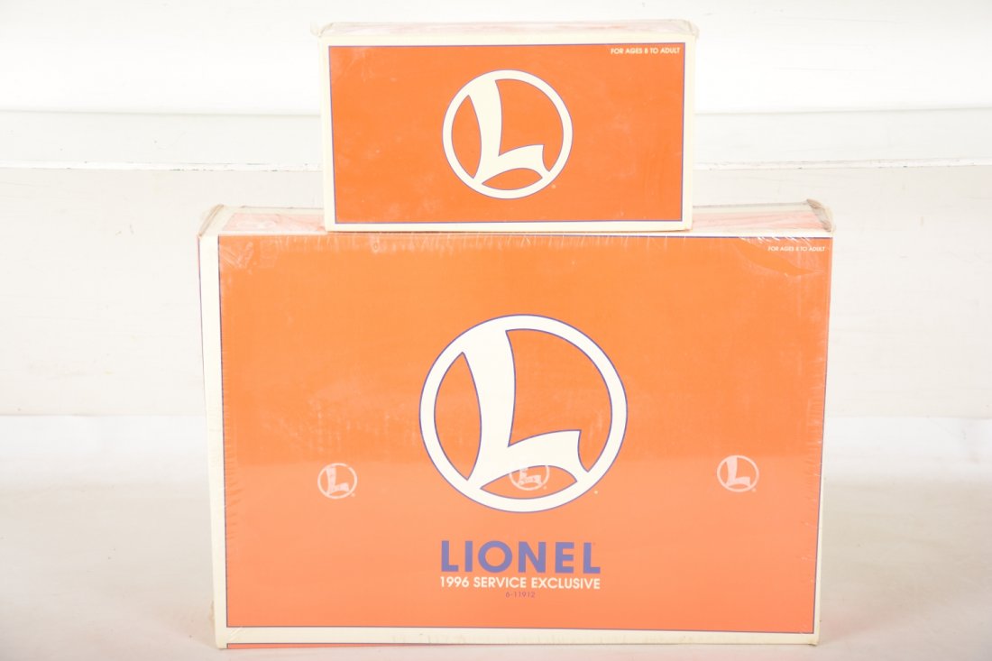 Extended Lionel 11912 Ore Train: Includes a diesel switcher with 3 cast ore cars; plus a 51502 ore car, all factory sealed in boxes, C10
