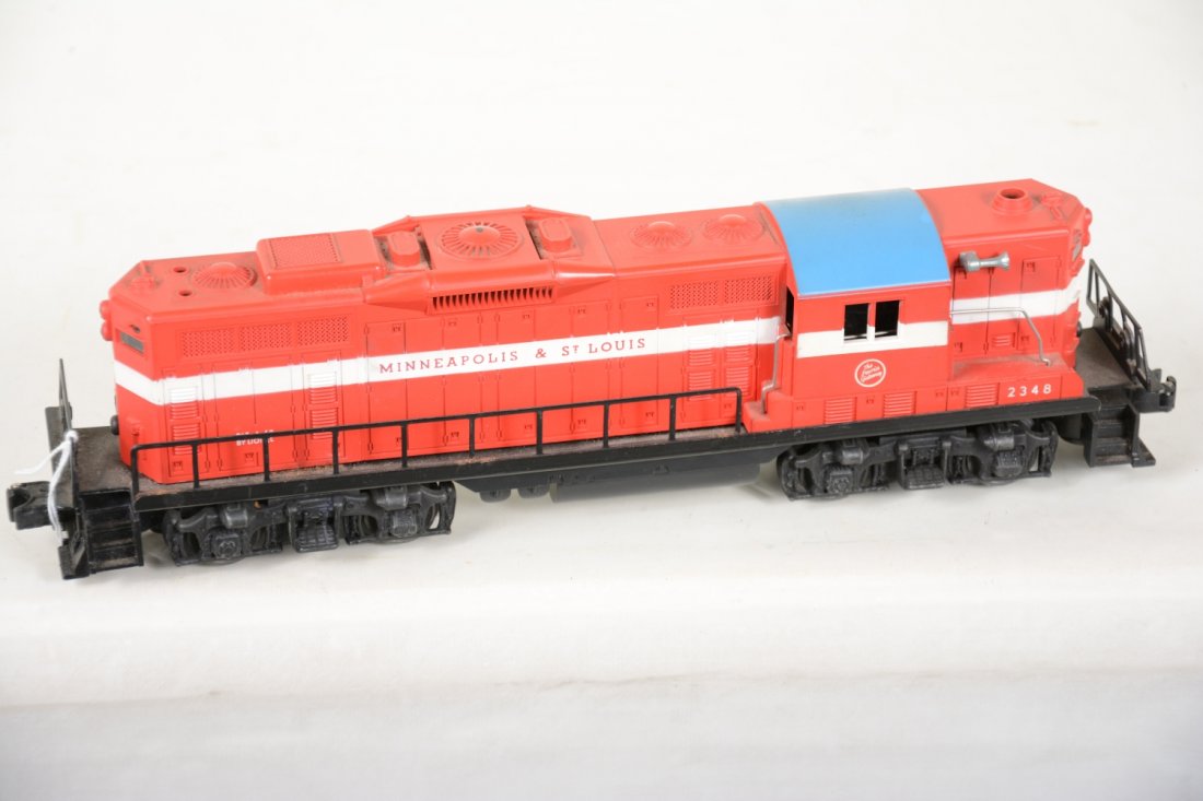 Clean Lionel 2348 M&StL GP9 Diesel: Nice matte patina with 1 box rub on 1 fan top. The battery box is clean and it shows light playwear, C7-7+