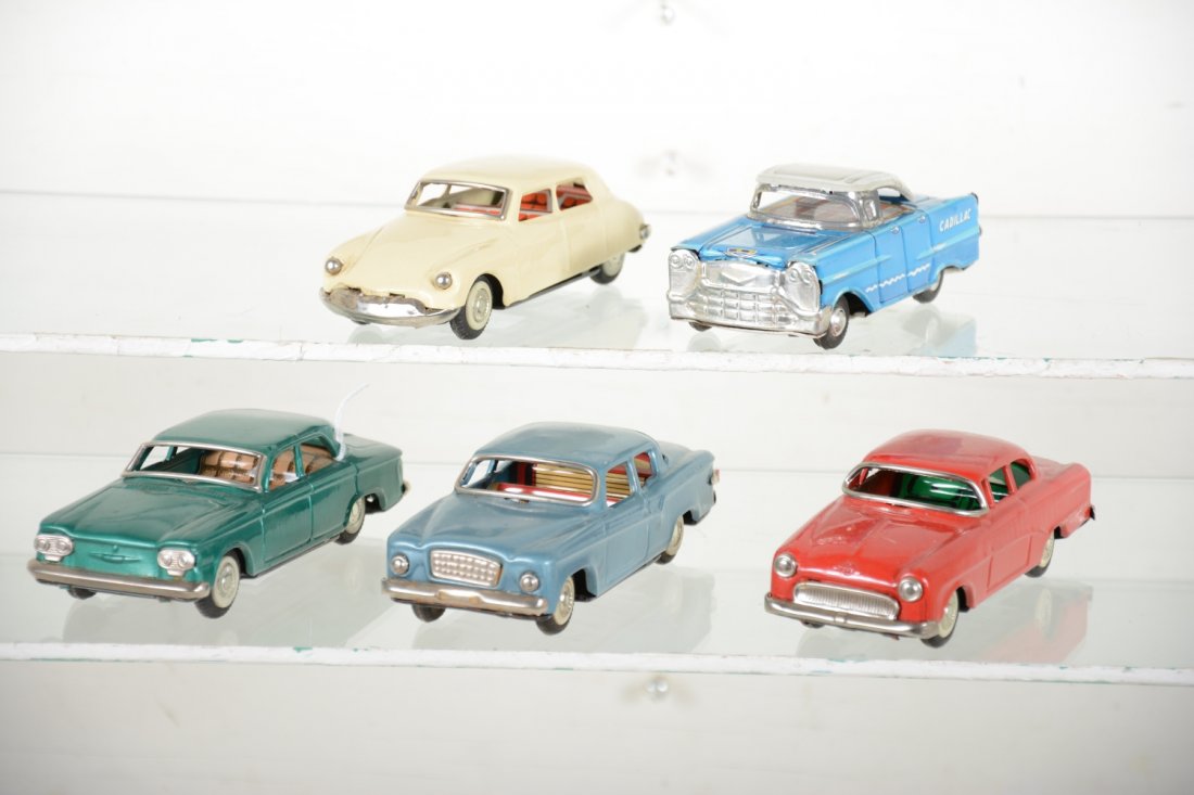 Clean Vintage Japanese Tin Automobiles: Longest is 5.5" long, all friction including a Chevy Corvair; Buick Lark; Citroen DL; Opel and Cadillac. Several of these were including on the SSS Japan Mobile Turnpike auto-loader Toy in friction & 