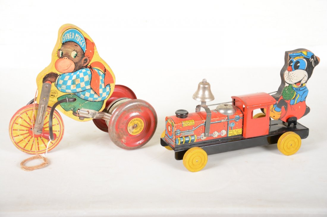 2 Scarce Gong Bell Toys: Includes a Trix Choo-Choo; J Fred Muggs tricycle. Both paper litho & metal parts, all showing light to moderate playwear, C7-7+