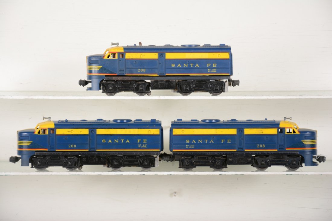 Lionel 208 SF Alco Group: Includes a paint matched pair, with power cab having a broken cowl, otherwise C7; second power unit is lesser condition with hairline cowl crack, C5+-6