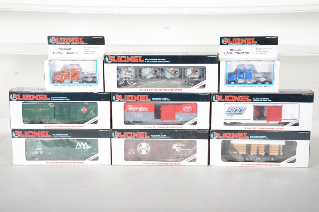 Lionel Freight Cars: Includes 19211 VR boxcar; 19210 SOO Boxcar; 16347 ON flat with lumber; 19216 SF boxcar; 16237 REA boxcar; 16225 Budweiser vat car; 16236 NYC boxcar; 2 #12794 tractors. Most appear new in boxes, C9-10