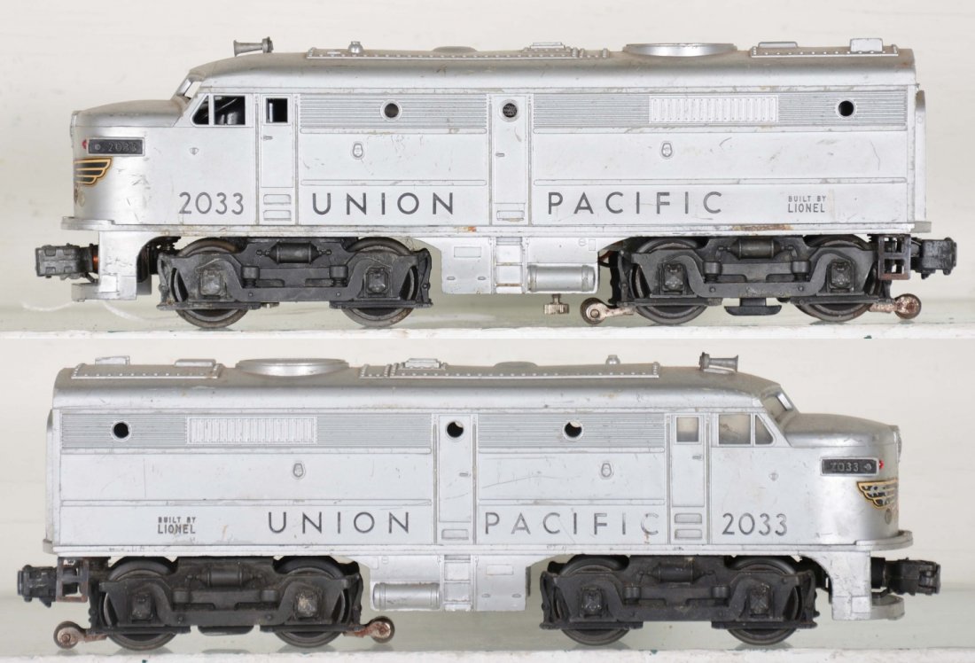 Lionel 2033 UP Alco AA Diesels: Clean matching shells with 93% decals intact. The battery box is clean, but reverse unit is loose and missing battery box cover. They show moderate playwear, C5+-6