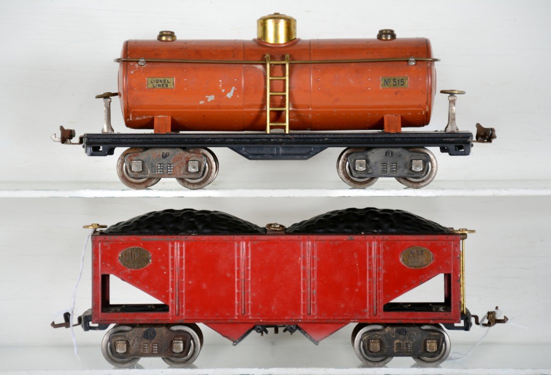 Lionel 516 & 515 Freight Cars: Standard gauge. Includes a 516 hopper & 515 terra-cotta tank car, 1 truck rusty. They are fairly clean, showing light to moderate playwear, otherwise C6-6+