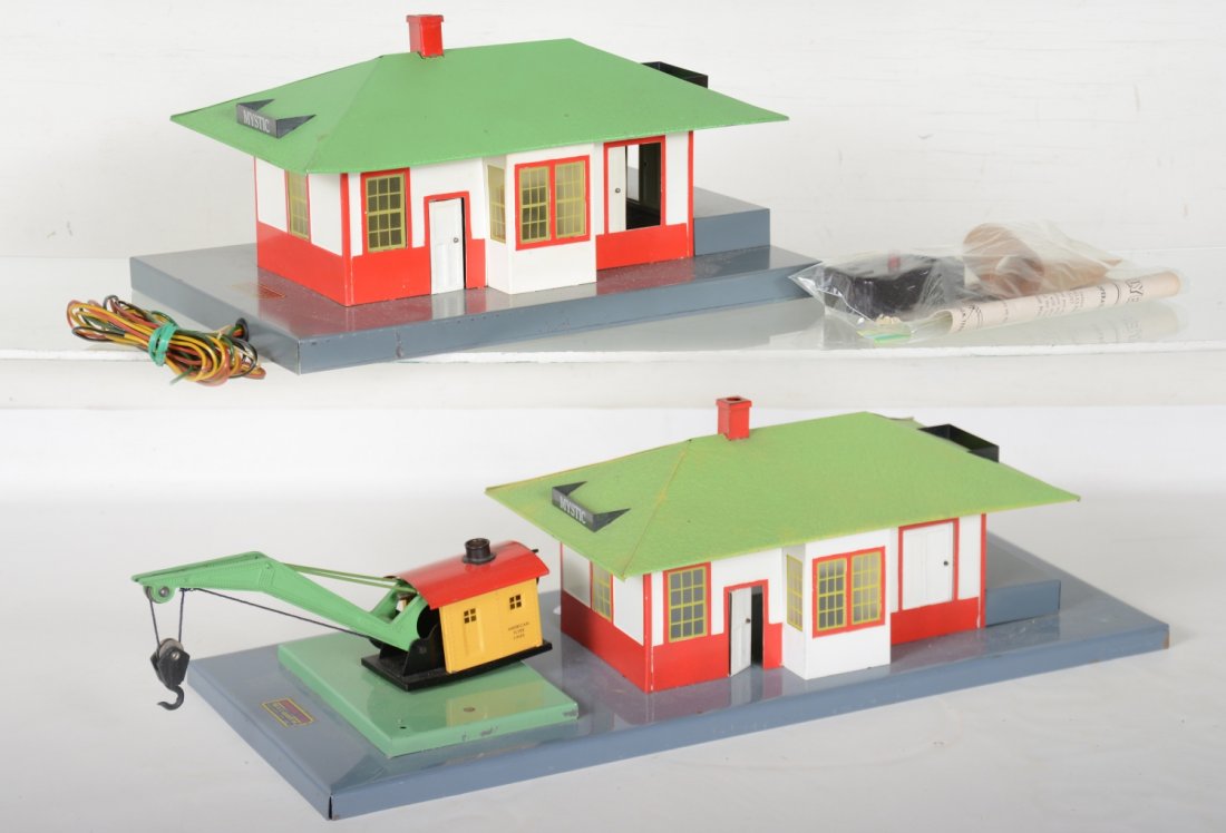 Clean American Flyer 615 & 755 Stations: S Gauge. Both are clean, complete and shiny with the 615 having light stains on roof. They show light playwear, C7-7+