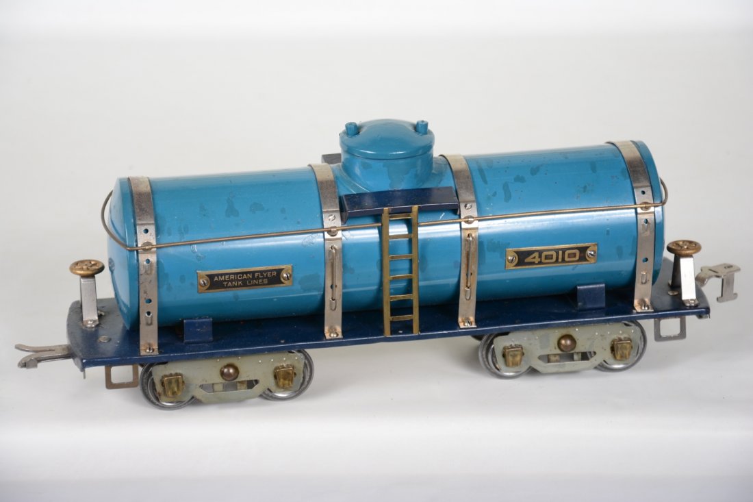 Scarce American Flyer Blue 4010 Tank Car: Standard gauge. Tough variation painted blue with nickel trim. It has a few touch-up spots, C5+-6