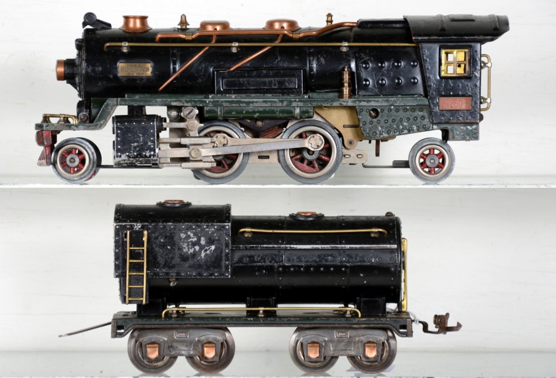 Lionel 260E Steam Locomotive: Motor is clean and appears ready to run. Shows moderate to heavy playwear, C4+-5