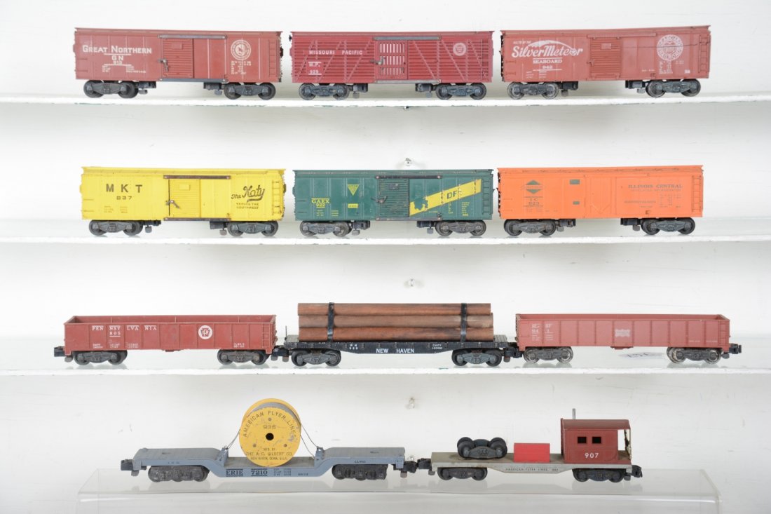 American Flyer Freight Cars: S Gauge. Includes a 941 Frisco gondola; 805 PRR gondola; 928 NH log car; 923 IC reefer; 929 MP stock; 942 SilverMeteor boxcar; 937 MKY boxcar; 922 GAEX boxcar; 936 reel car, C5; 913 GN boxcar, heat-st