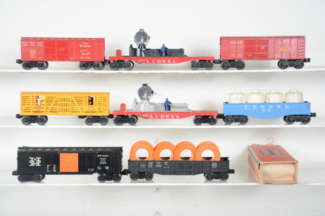 Late Lionel Freight Cars: Includes boxed 6112-85 gondola with canisters; 638-2361 Van Camps bank car; 6464-425 NH boxcar, type III; 6463 horse transport; 2 different 6822 night crew searchlights; 6062 gondola with reels, 1 chi