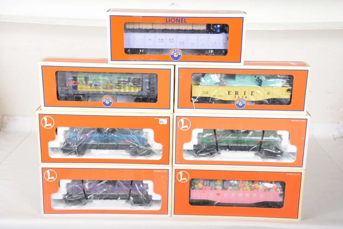 Lionel Freight Cars: Includes 29300 Clean Aquarium car; 16153, 16154, 16155 AEC Reactor cars; 19459 Valentine gondola; 37032 Operating barrel Car; 37001 pastel operating gondola. They appear like new with boxes, C9-10-