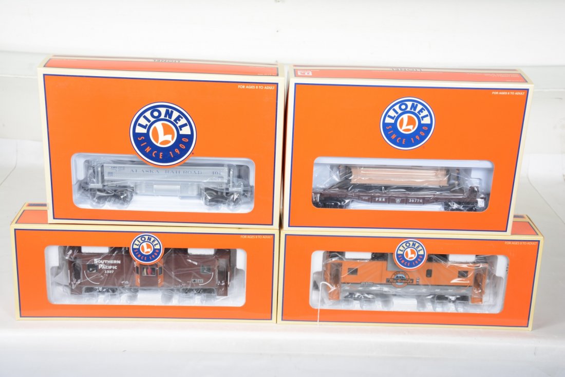 Lionel Freight Cars: Includes 36774PRR Moe & Joe operating lumber car; 36765 Alaska coal dump car; 17653 SP baywindow smoke caboose; 17650 DRGW smoke caboose. All appear new in boxes, C10