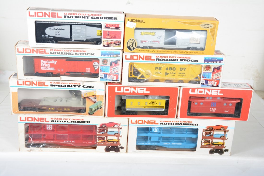 Lionel MPC Freight Cars: Includes 9435 LCCA boxcar; 7509 Kentucky Fried reefer; 9276 Peabody hopper; 9302 L&N searchlight; 9163 SF caboose; 9431 JLC boxcar; 9281 SF auto-carrier; 9216 GN auto-carrier; 9166 RG caboose. They sh