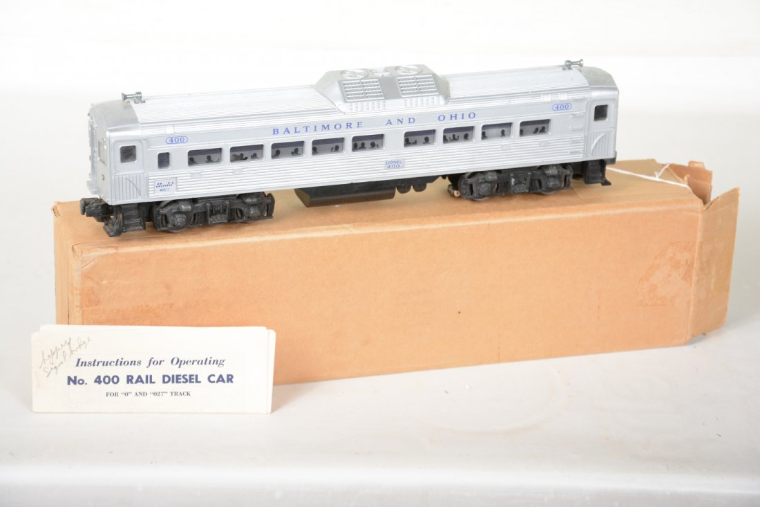 Boxed Lionel 400 RDC-1 Budd Diesel: Clean shell with nice lettering. Minor rust spot in battery box on frame, inside clean. It shows light runtime with instructions and box, otherwise C7