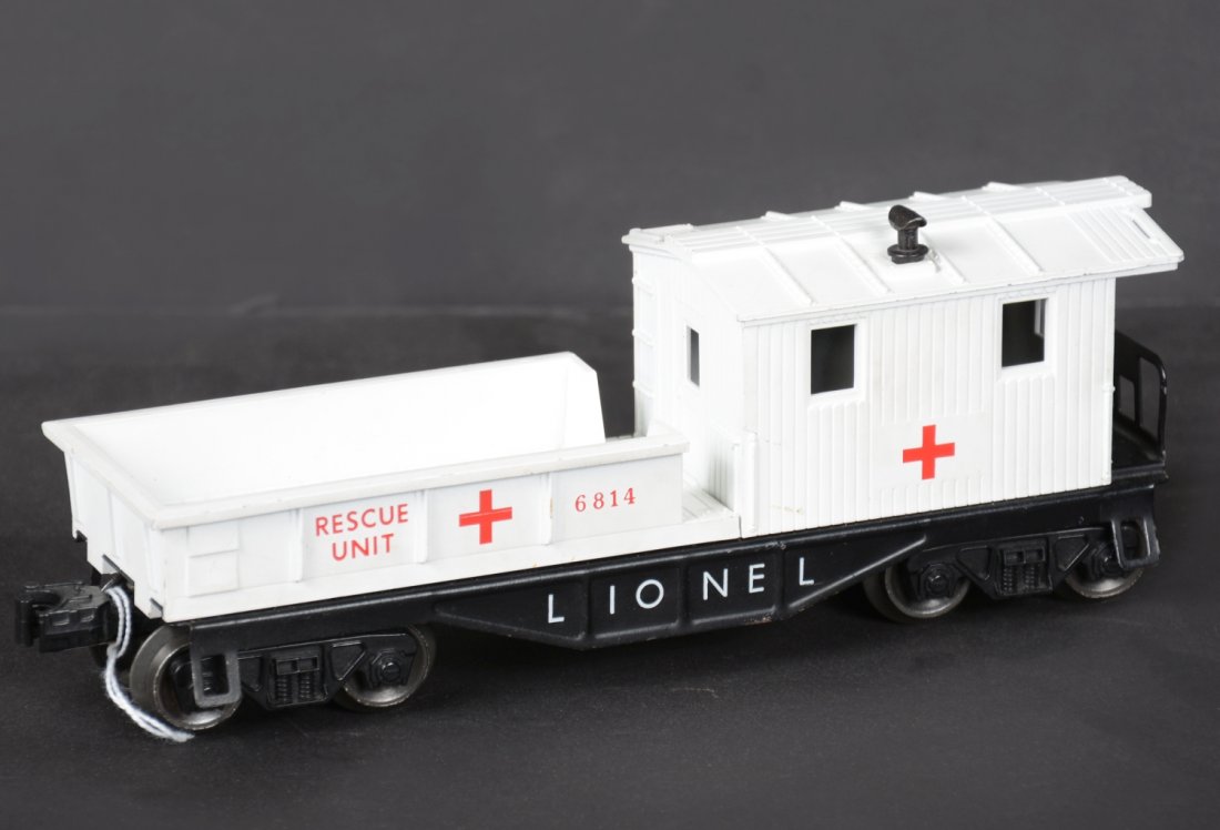 Unusual 6824-50 Rescue Caboose: Clean and as issued with empty tray with black frame, Sears sets only. It shows light playwear, C8