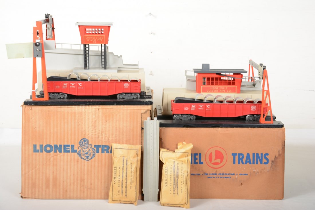 Boxed Lionel 342 & 345 Culvert Loading/ Unloading Set: Includes the 342 Culvert loader; 345 culvert unloader with bridge. They both have their 6342 culvert gondolas with original loads. Both have their packets, box inserts and boxes. They show light to mo