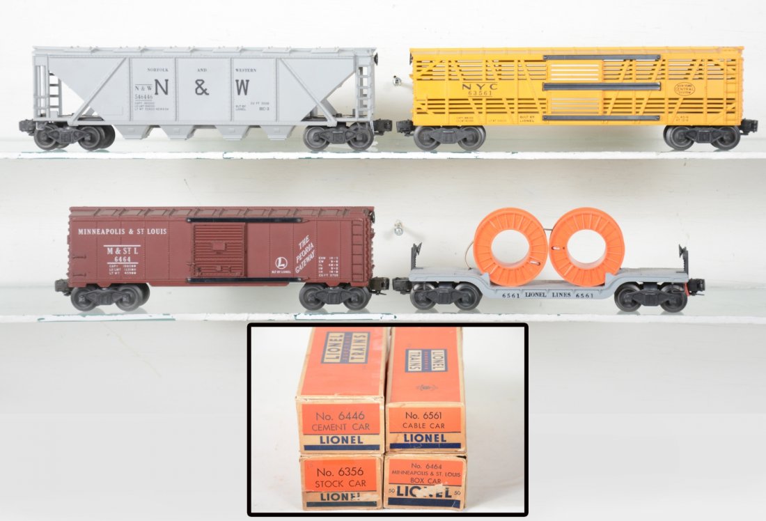 Clean Boxed Lionel Freight Cars: Includes 6446 N&W cement hopper; 6356 NYC stock car; 6464-50 M&StL boxcar, type I; 6561 reel car, band stretched. They show light playwear with boxes, C7+-8