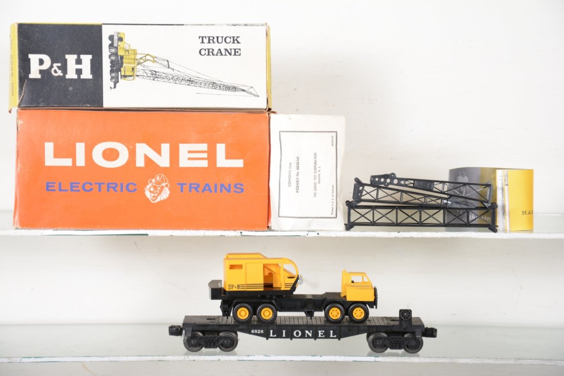 Nice Boxed Dark Lionel 6828 P&H Crane: Nice and complete with inner box, instructions and booklet & packet. Parts are original and intact, 3 doors loose, but included with boom separate from body. showing light handling, C8