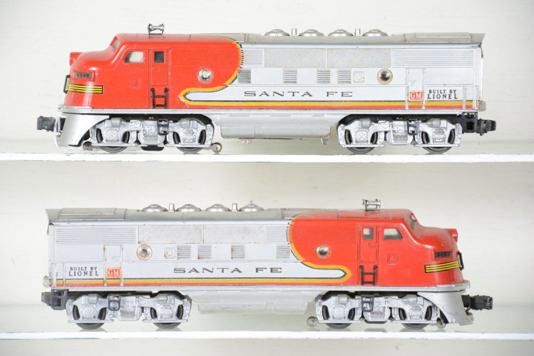 Lionel 2343 SF F3 AA Diesels: Matched pair with some decal chips at door frames. The battery box is clean and they show moderate playwear, C6
