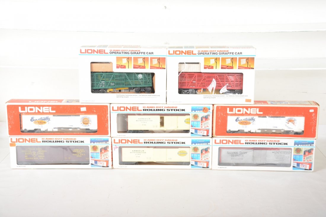 Lionel MPC Freight Cars: Includes 7904 & 7913 giraffe cars; 5702 National reefer; 2 #5708 Armor reefers; 2 #9860 Gold Medal reefers; 5706 Lindsay reefer. They show light runtime with boxes, C9