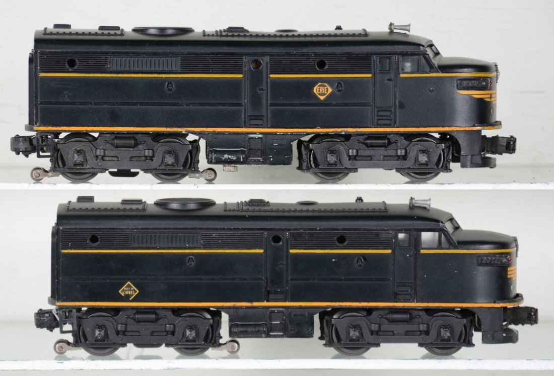 Clean Lionel 2032 Erie Alco AA Diesels: Matched pair with power unit having 90% nose decal intact, missing 1 side decal, battery box is clean; Dummy has 80% nose decal intact, missing 2 side decals. They show light to moderate playwear, oth
