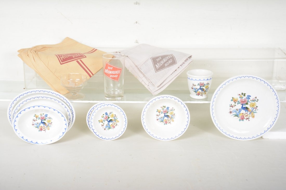 Milwaukee Road Railroad China Dinnerware: Syracuse Chine stampings. Includes a double-egg cup; 2 -4 3/14" berry bowls; 6" cereal bowl; 8 1/4" plate; Highball glass; unmarked wine glass; 6 3/8" oblong bowl; 7 & 8" oblong plates. Dishes are fre