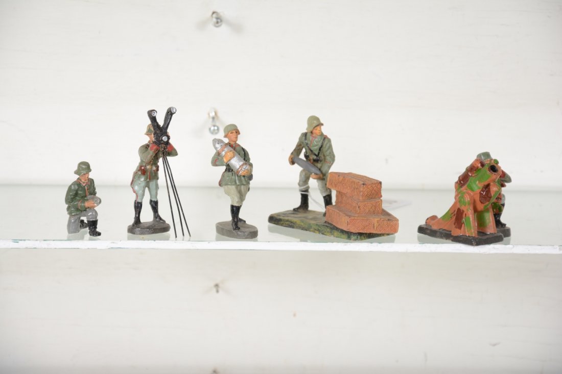 Super Elastolin Mortar Gun Crew: Includes an soldier remove shell from crates; soldier carrying; soldier loading; Mortar with operator and sighter on tripod. All are clean and 95% or better, intact, showing light playwear, C8+