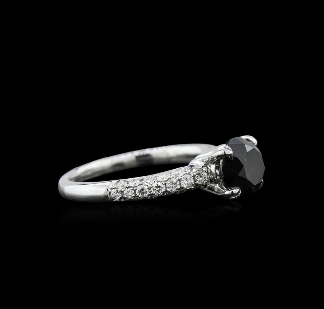1.97 ctw Black Diamond Ring - 18KT White Gold: One electronically tested 18KT white gold ladies cast diamond engagement ring with a bright polish finish. Identified with markings of "18K". Condition is new. Containing: One prong set round brillian