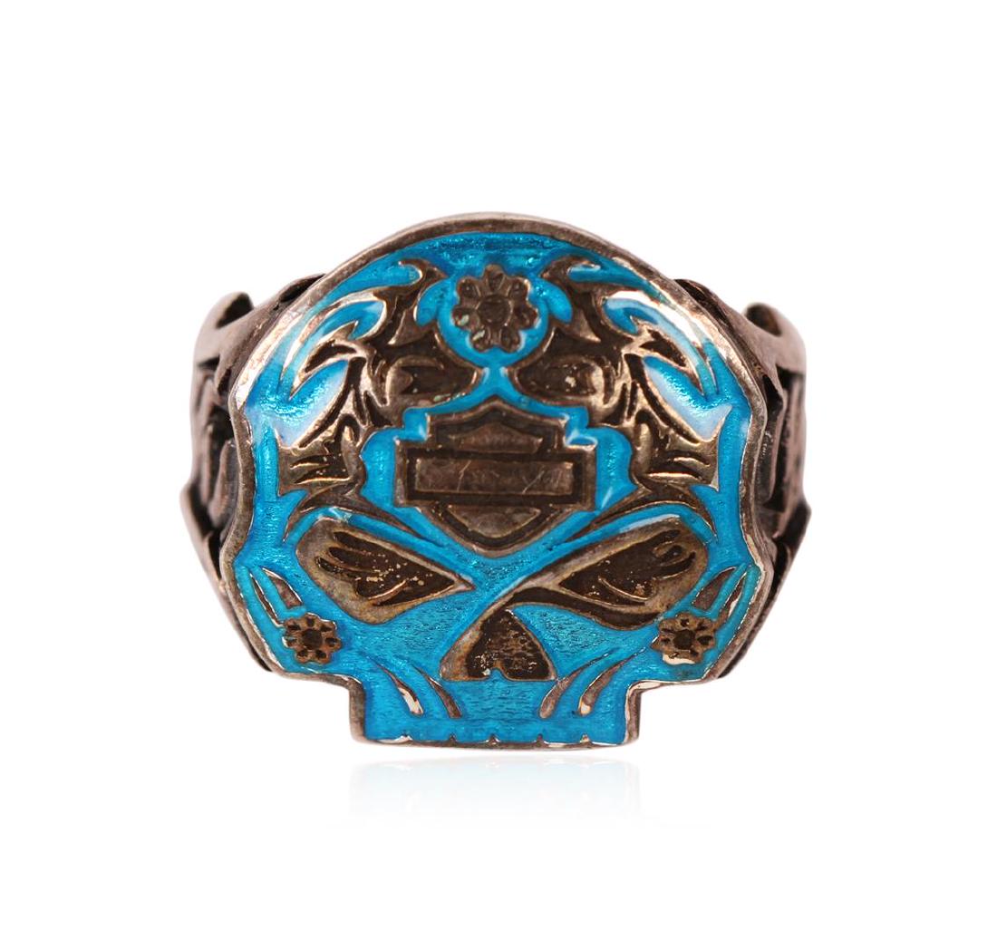 Harley Davidson Sterling Silver and Enamel Ring: One sterling silver and enamel Harley Davidson ring. The ring weighs a total of 11.00 grams.