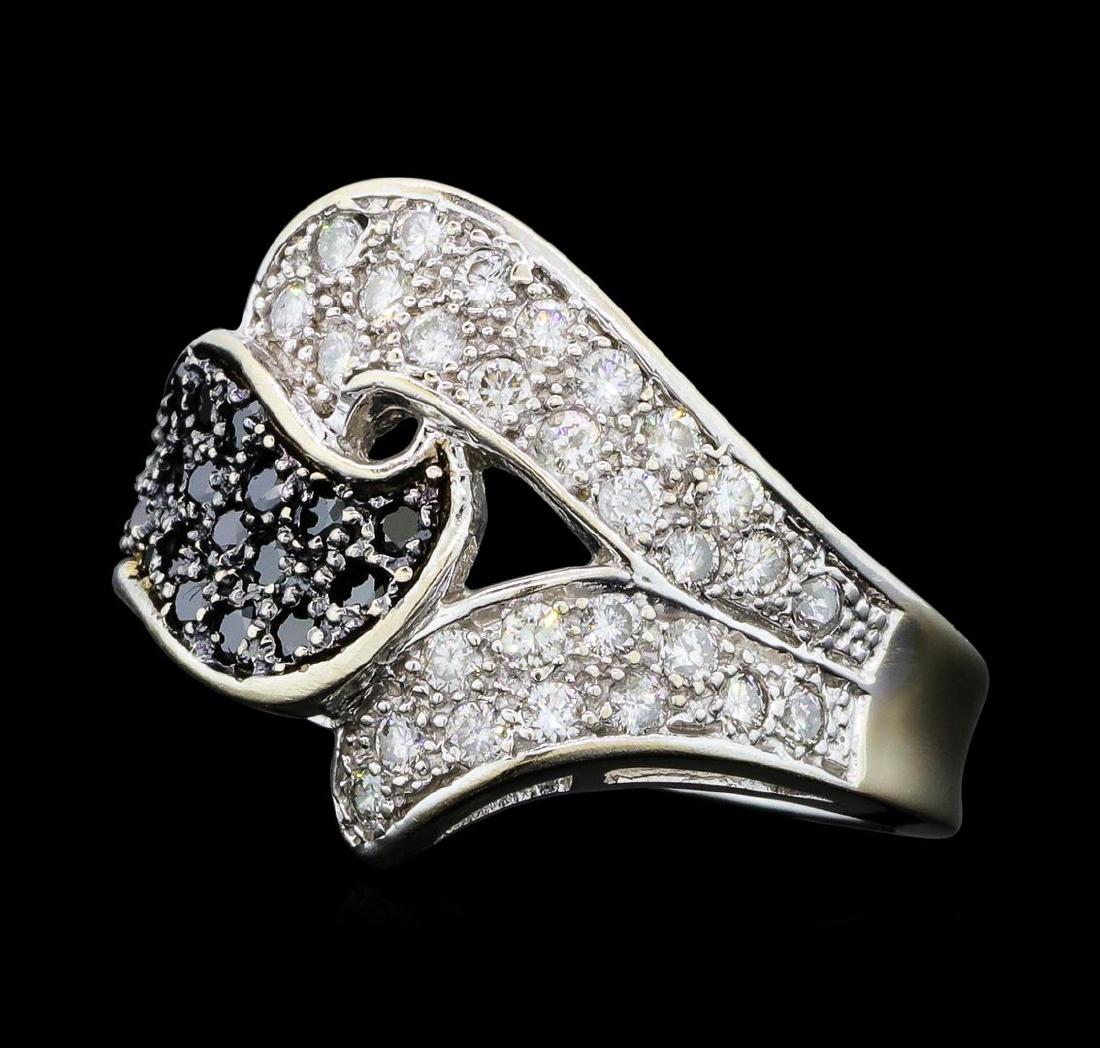 0.90 ctw White and Black Diamond Ring - 14KT White Gold: One lady's ring featuring: 14KT white gold weighing 7.5 grams containing white diamonds weighing 0.56ctw and black diamonds weighing 0.40ctw.