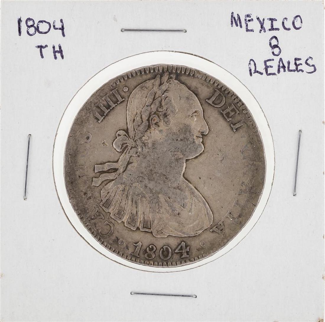 1804 TH Mexico 8 Reales Coin: One 1804 TH Mexico 8 Reales Coin.