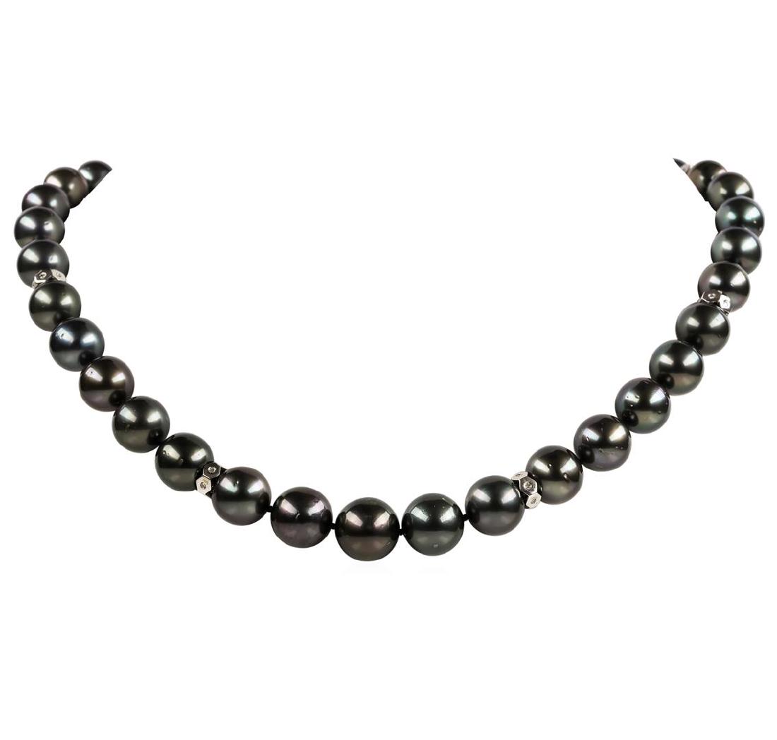 Pearl and Diamond Necklace: One graduated single strand pearl necklace 19.0' princess length, knotted with a tongue clasp & foldover safety containing 35 Tahitian pearls, 14.2mm to 11.0mm in size. The pearls are black in color, 