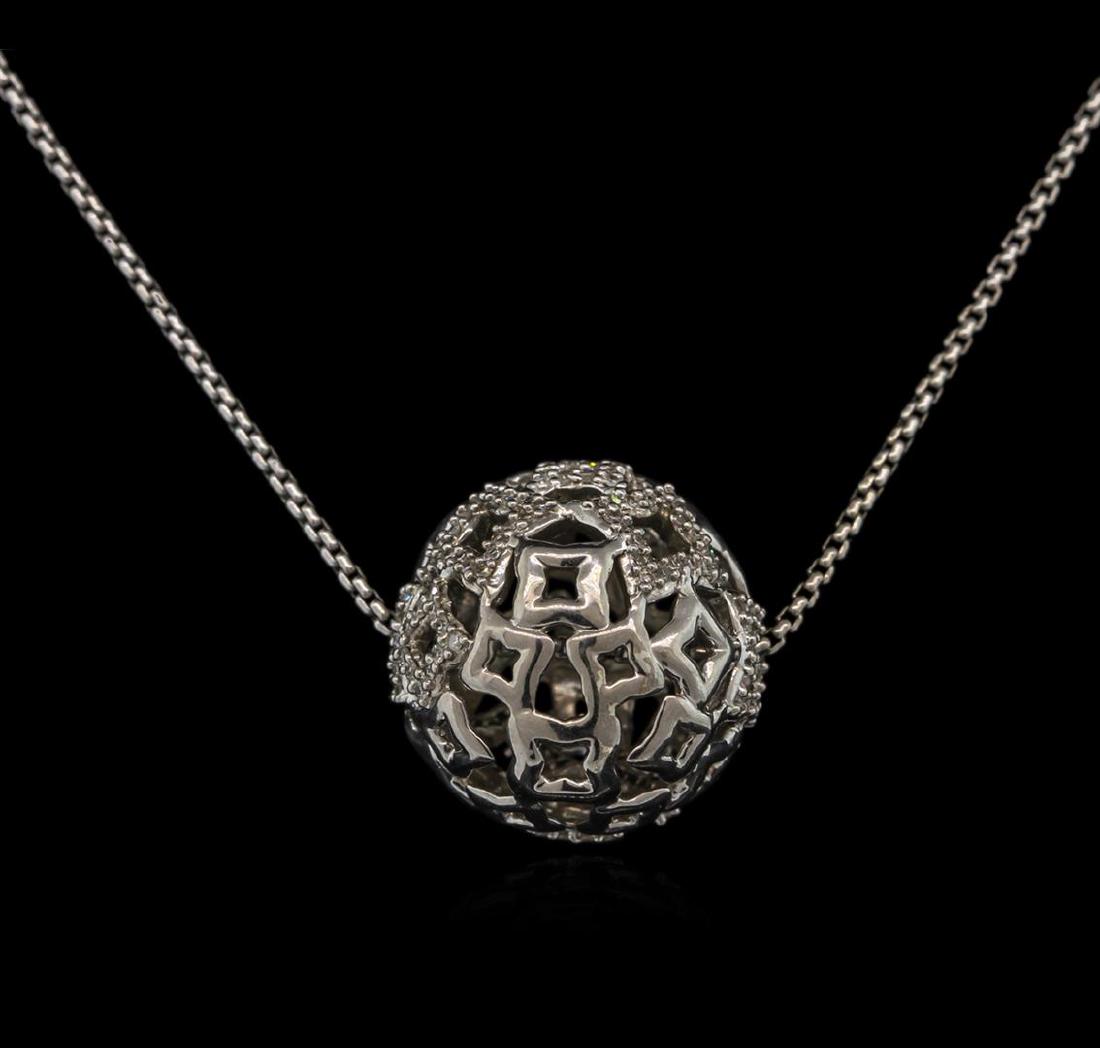 0.20 ctw Diamond Ball Pendant With Chain - Silver: One ball pendant with chain featuring: silver weighing 9.01 grams containing prong set round diamonds with a total weight of 0.20ct.